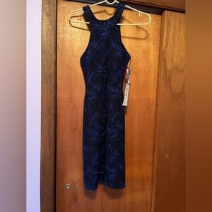 Women's blue and black dress sparkles